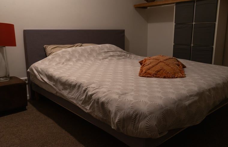 Cozy bedroom in Holiday home in Best, Heart of Brabant, North Brabant, with comfortable double bed for a relaxing stay.