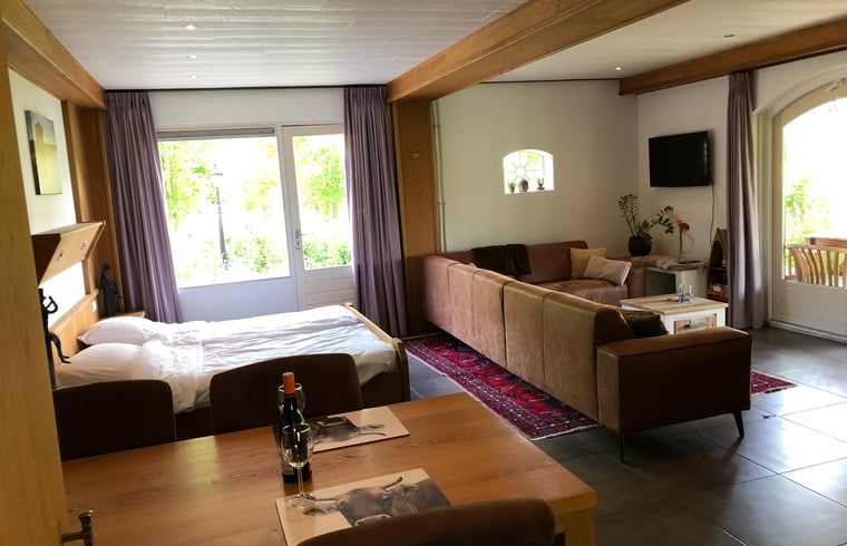 Gezellige woonkamer in Vakantiehuisje in Cuijk, Noordoost Brabant, Noord Brabant.