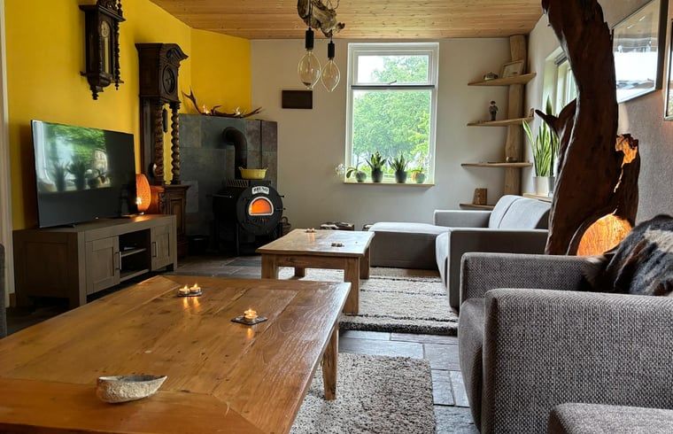 Ferienhaus in Gemert, Nordbrabant, mit gemuetlichem Wohnzimmer und gemuetlichem Kaminofen.