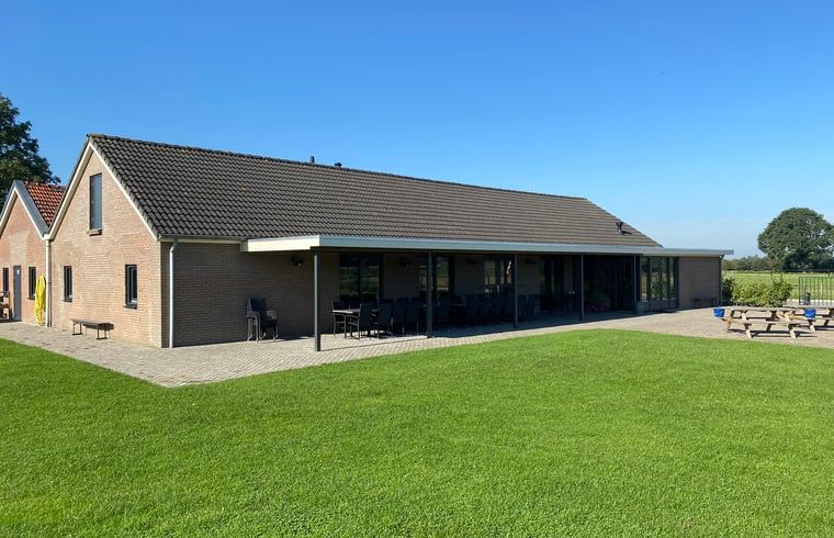 Huisje in Nistelrode, een vakantiehuis in Noordoost Brabant met ruime veranda en groen uitzicht.