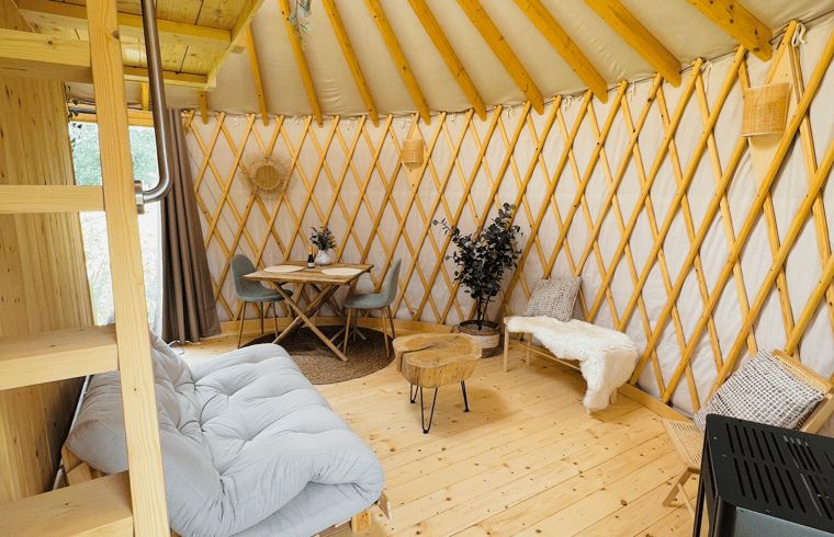 Cozy sleeping room in Holiday Home in Ledeacker with wooden ceiling and skylight.