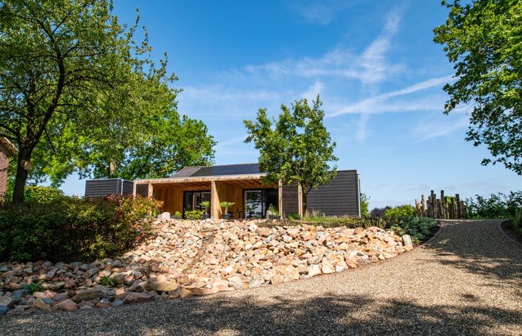 Vacation home in Sint Agatha, North Brabant with beautiful views and spacious garden.