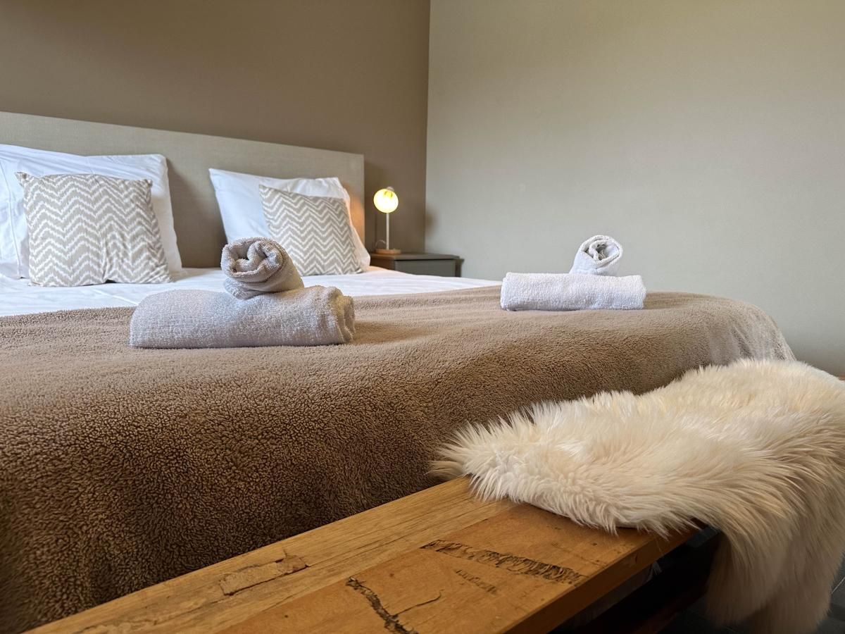 Cozy bedroom with luxurious details in Villa Bianco, North Brabant.