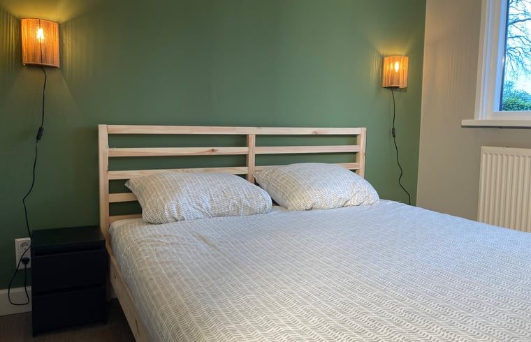 Comfortable bedroom in Cottage in Oosterhout, vacation home in Oosterhout, West Brabant, North Brabant.