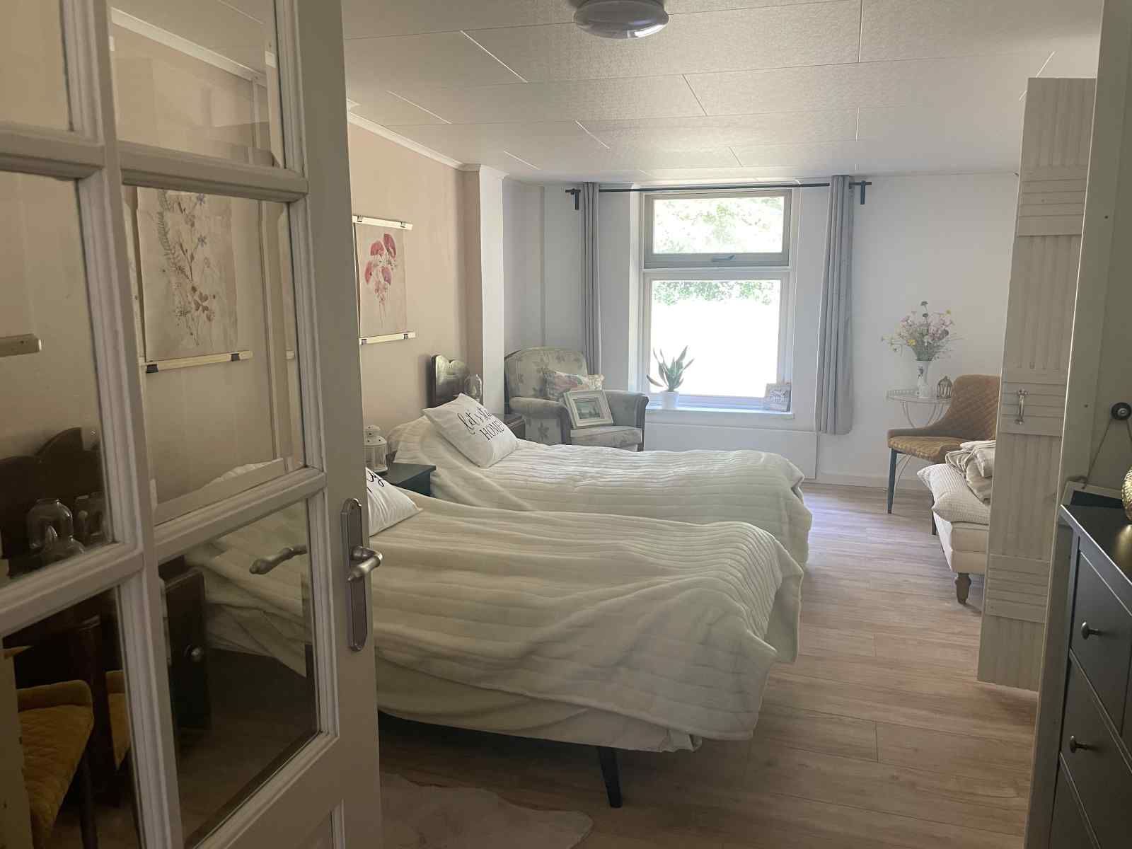 Stijlvolle woonkamer in NB094 vakantiehuis, Molenschot, West Brabant, met comfortabele zitplaatsen.