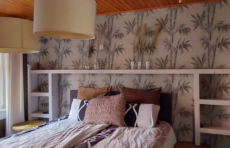 Wohnzimmer von Huisje in Sprundel, einem Ferienhaus in Nordbrabant mit bequemen Sitzgelegenheiten.