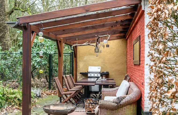 Overdekte veranda bij Huisje in Putte, vakantiehuis in West Brabant, Noord Brabant.