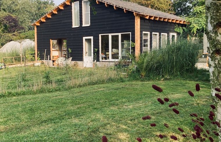 Exterior of Holiday home in Fijnaart, North Brabant with beautiful garden.