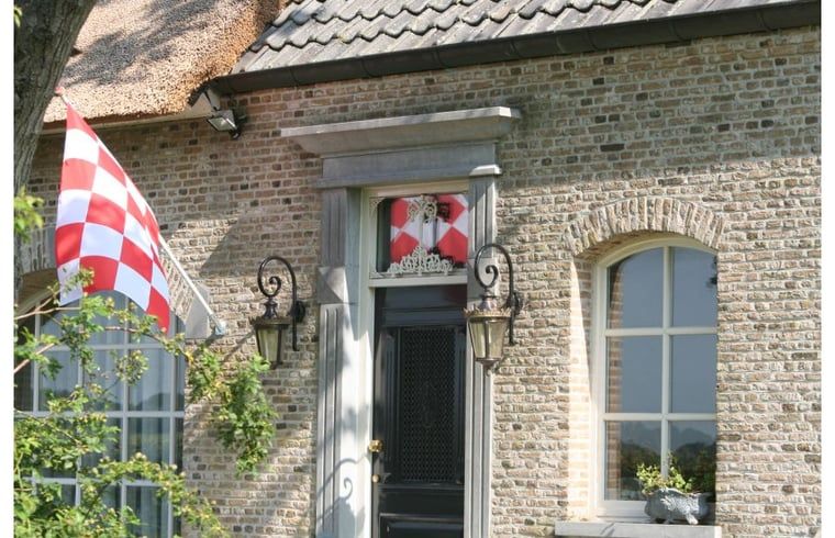 Charmant Huisje in Moerstraten, een vakantiehuis in West Brabant, met authentieke gevel en landelijke sfeer in Noord Brabant.
