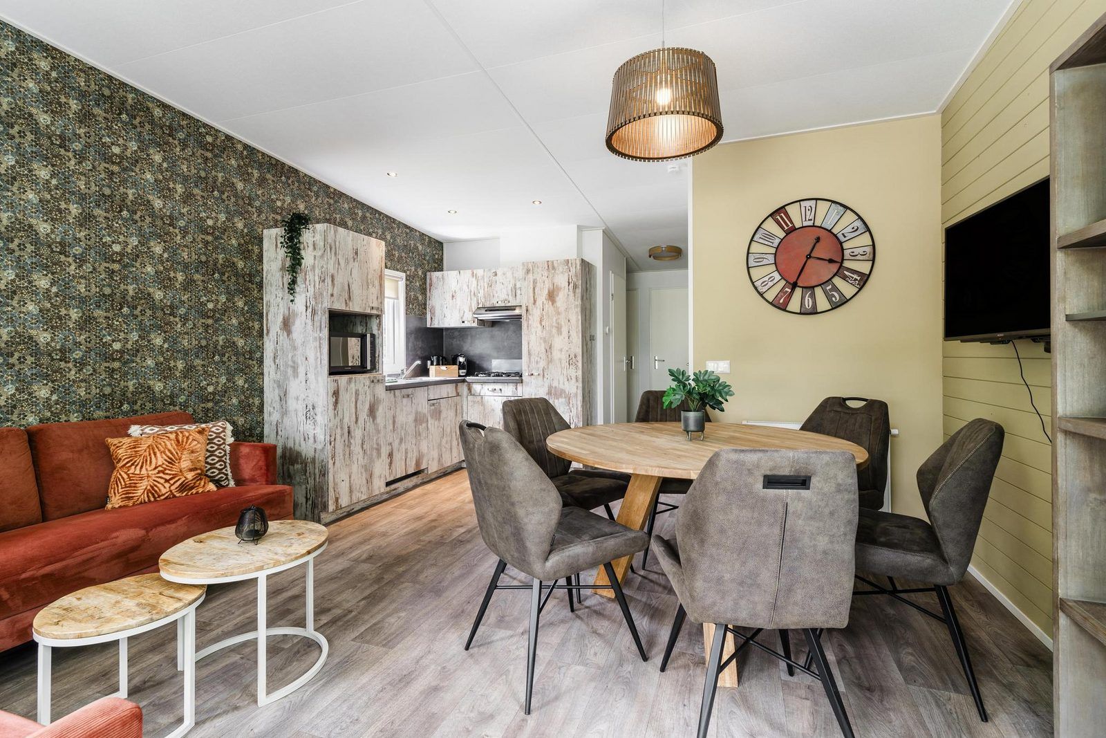 Cozy interior of Beach House sleeps 6 in Julianadorp, North Sea Coast, with modern kitchen and comfortable seating area.