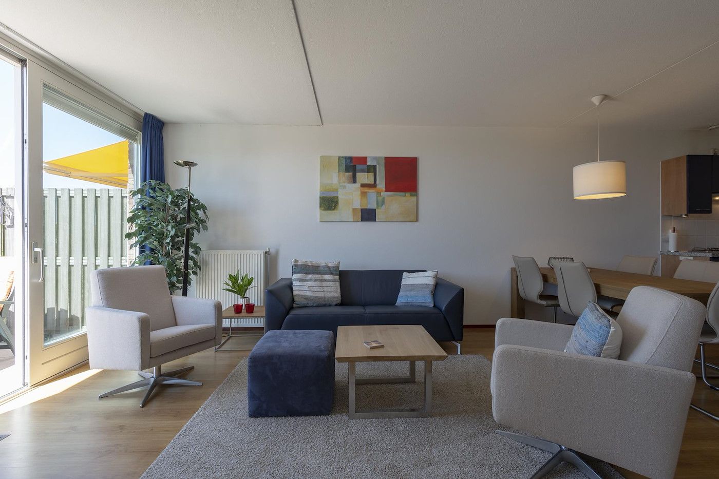 Comfortable sitting area in Duinerei C002 Groote Keeten vacation home in Callantsoog, North Sea coast, North Holland.