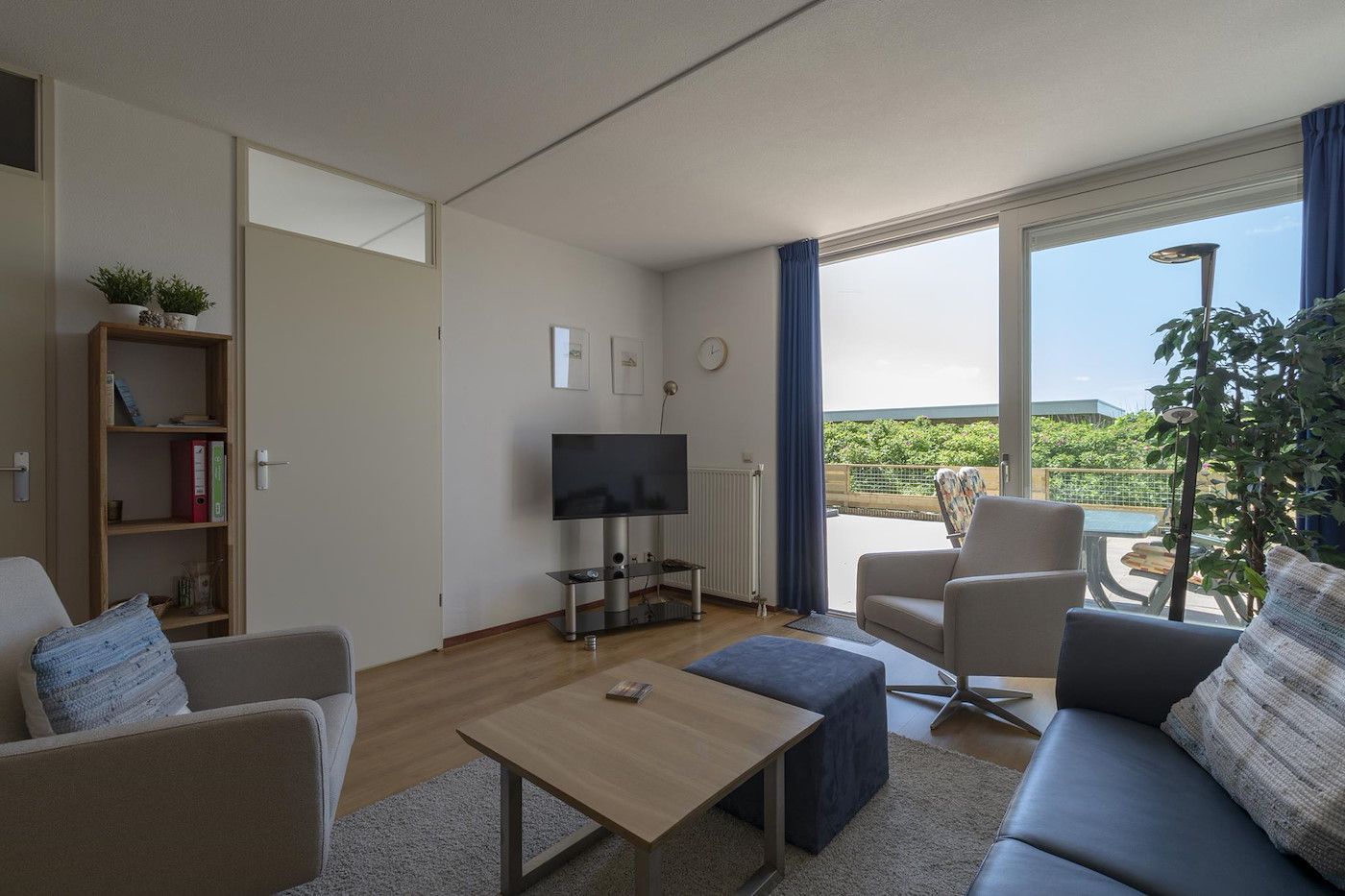 Cozy living room in Duinerei C002 Groote Keeten vacation home in Callantsoog, North Sea coast, North Holland.