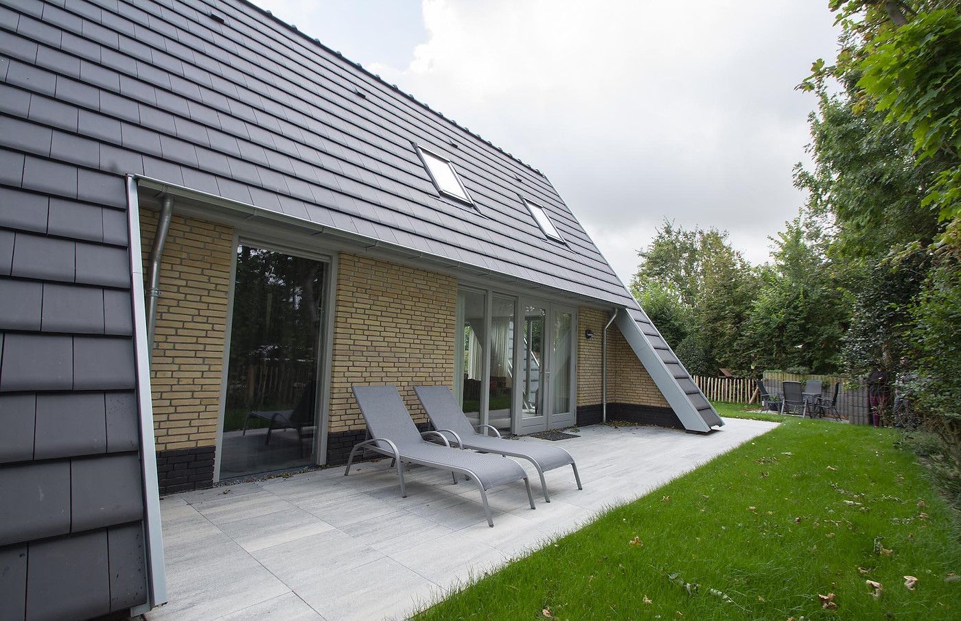 Garten von Sandepark 171 Groote Keeten, Ferienhaus in Callantsoog mit Sonnenterrasse an der Nordseekueste, Nordholland.