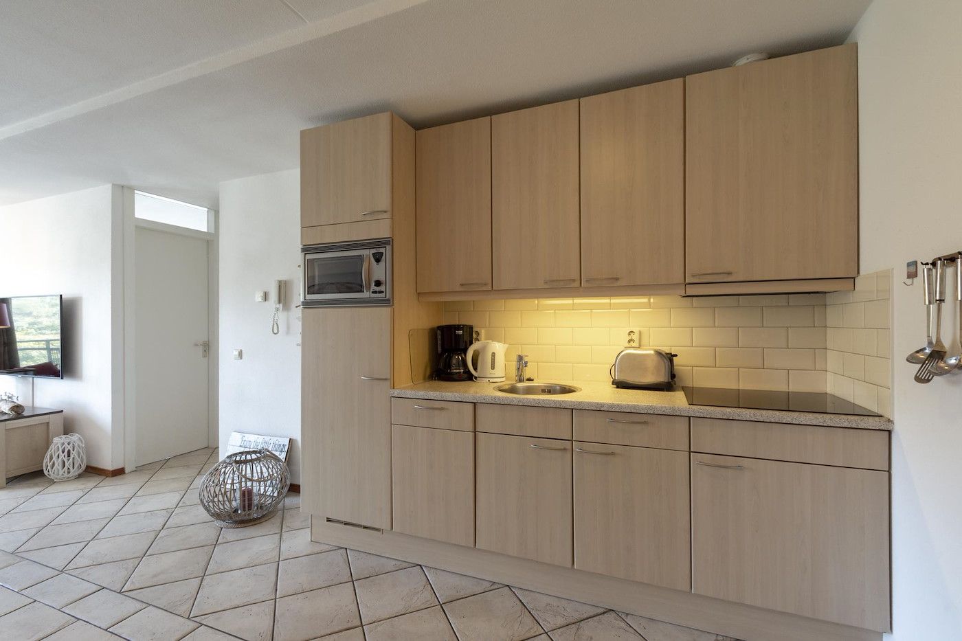 Schlafzimmer mit Aussicht im Ferienhaus Wijde Blick 211 Callantsoog, Nordseekueste, Nordholland.