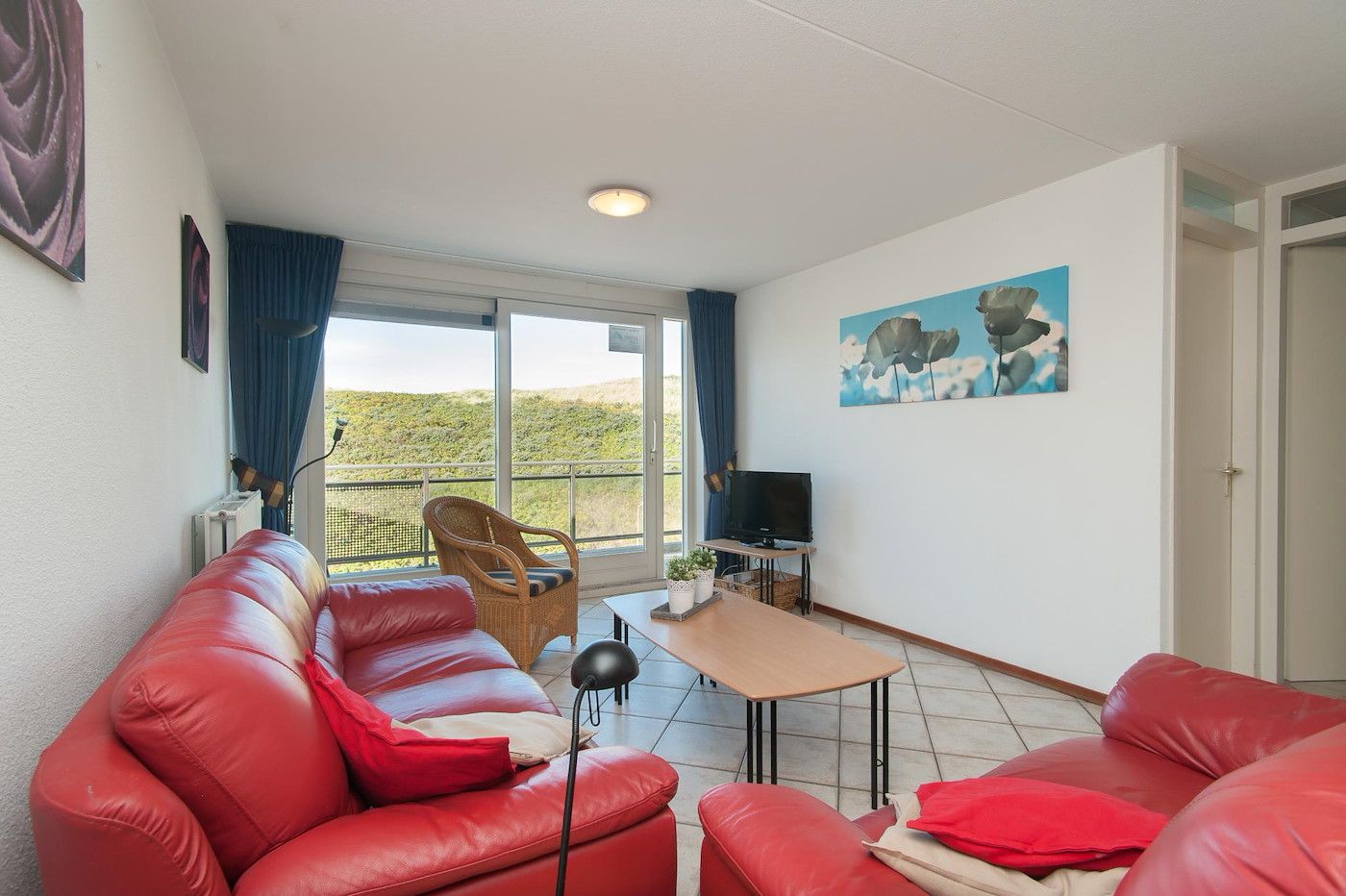 Gemuetliches Wohnzimmer des Ferienhauses Wijde Blick 310 Callantsoog an der Nordseekueste in Nordholland