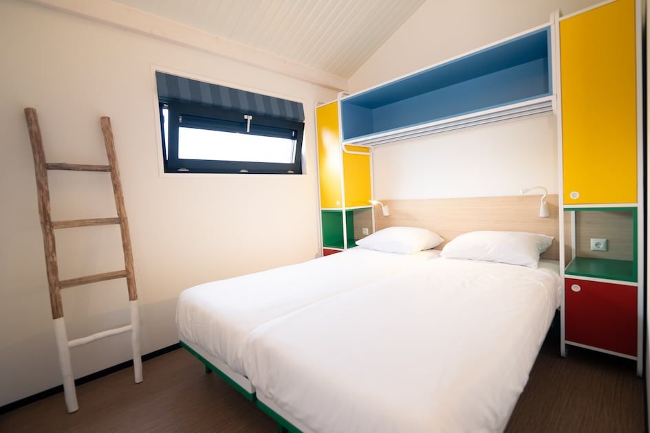 Bedroom with double bed in Callants Comfort 4 vacation home, Callantsoog, North Sea coast.