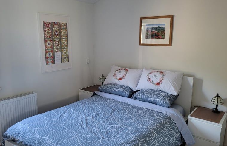 Tweede slaapkamer in Vakantiehuisje in Egmond aan den Hoef met stijlvol interieur, Noord-Holland.