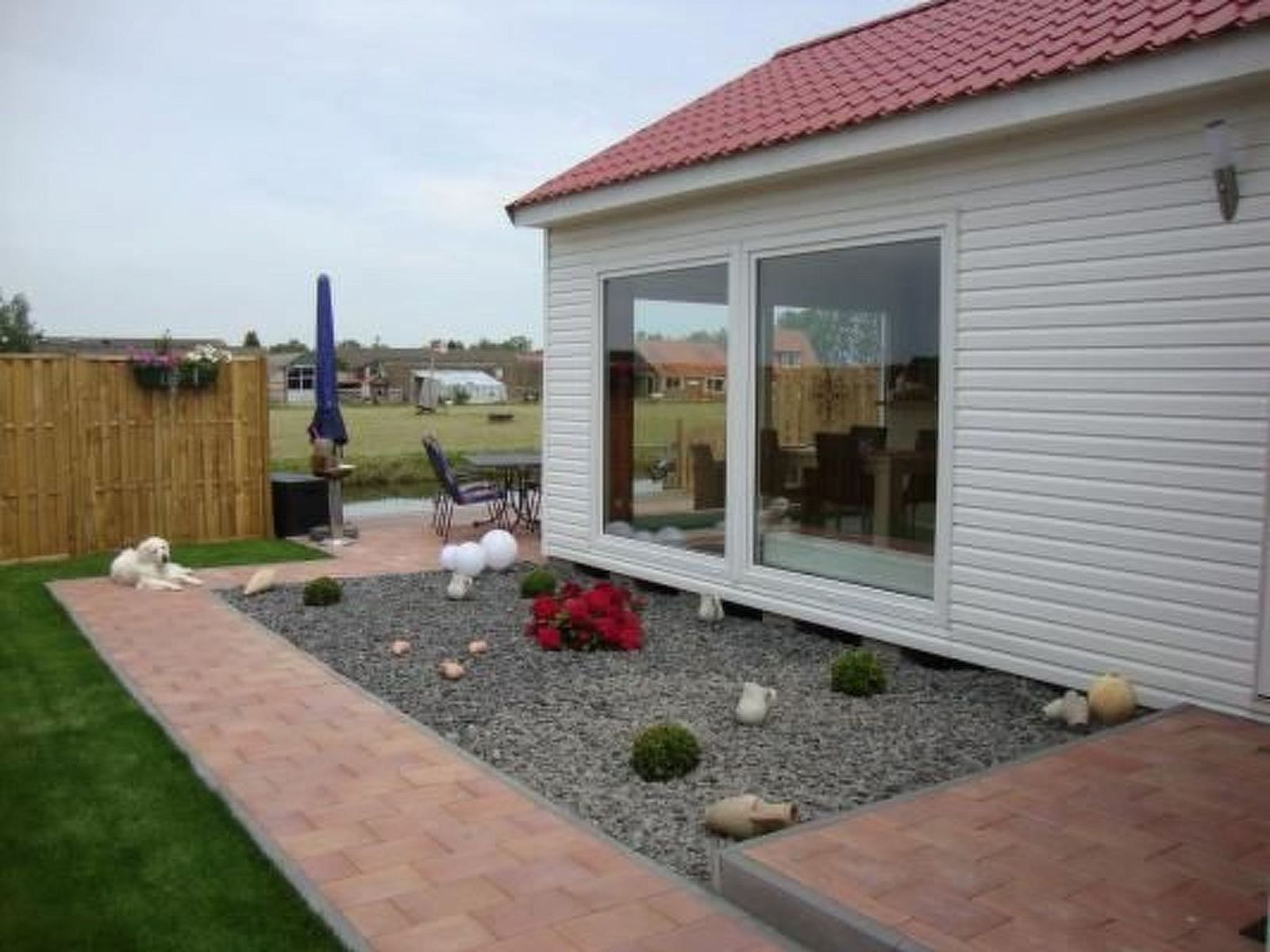 Guest house 460109 - Holiday property IJsselmeerkust - Vakantiehuis Auszeit direkt am Wasser