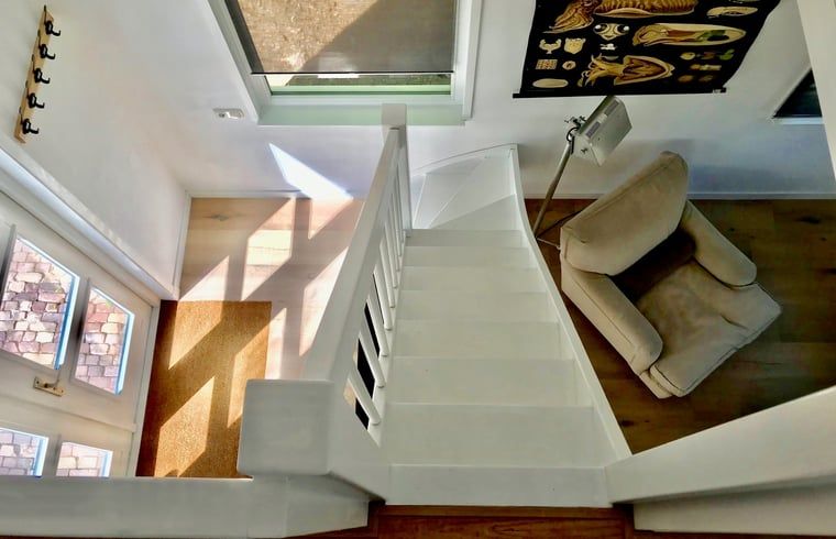 Cozy indoor area in Holiday Home in Andijk with comfortable seating area, ideal for relaxation.