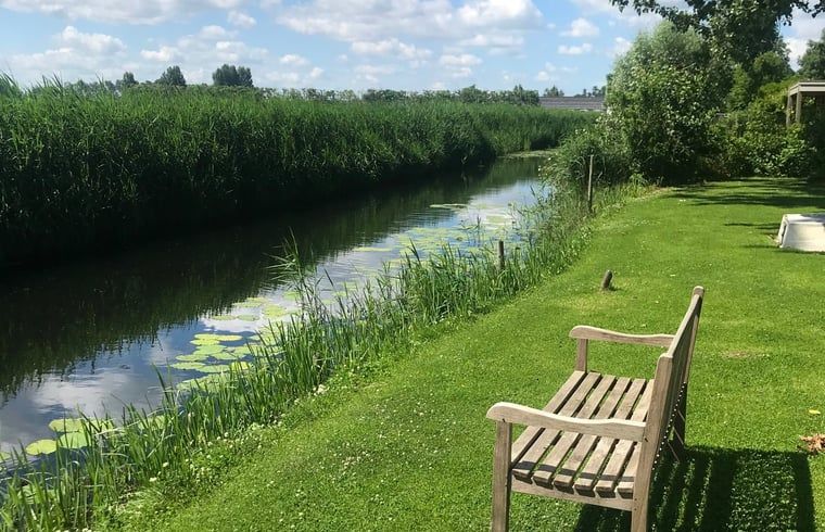 Restful view of ditch at Holiday home in Andijk, surrounded by green nature.