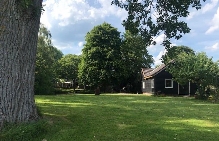 Expansive garden at Holiday home in Andijk, perfect for a relaxing stay in North Holland.