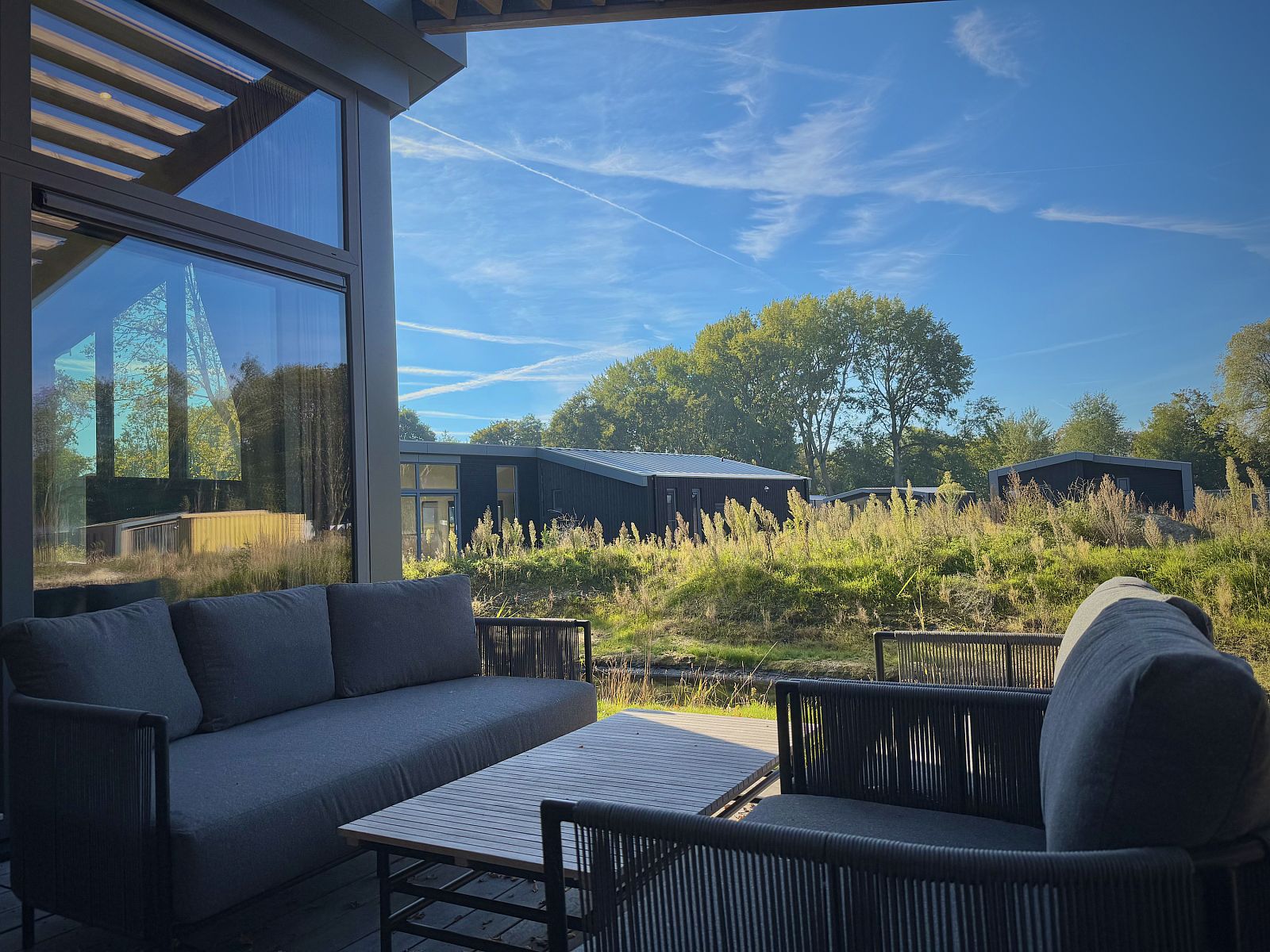 Enjoy the serene veranda at the detached house in Enkhuizen, vacation home on the IJsselmeer coast, North Holland.
