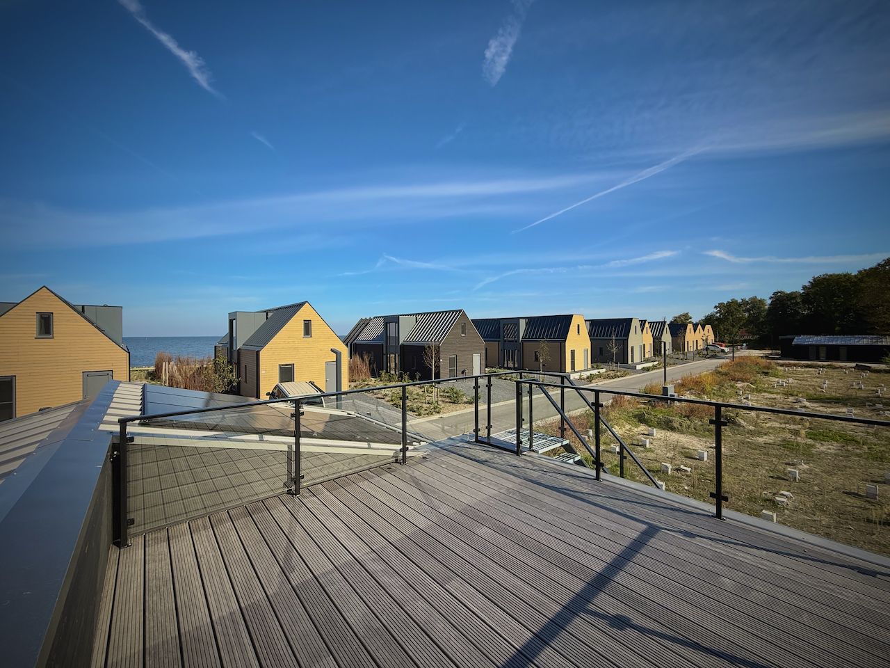 View from the terrace of the detached house in Enkhuizen, located on the IJsselmeer coast in North Holland, with modern architecture.