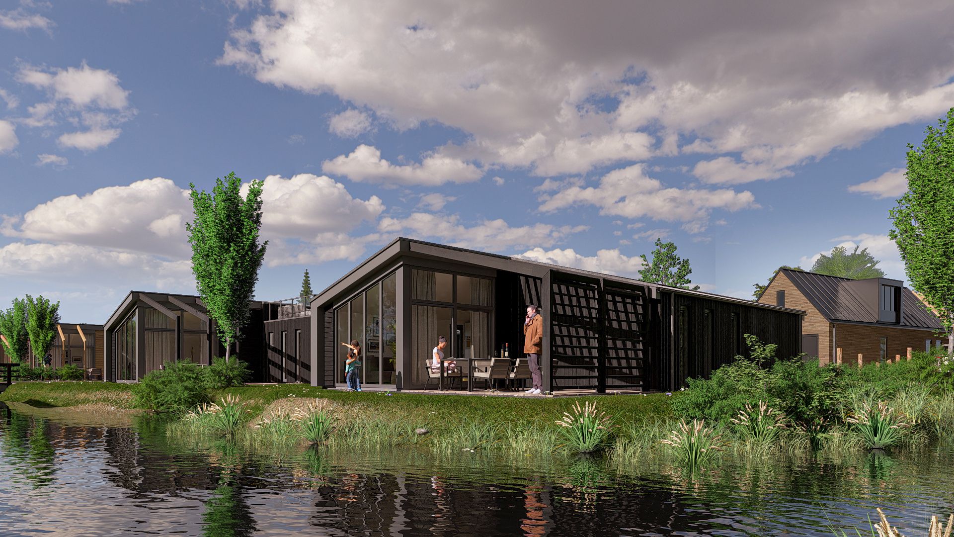 Terras van Chalet in Enkhuizen, vakantiehuis aan de IJsselmeerkust met panoramisch uitzicht op het water.