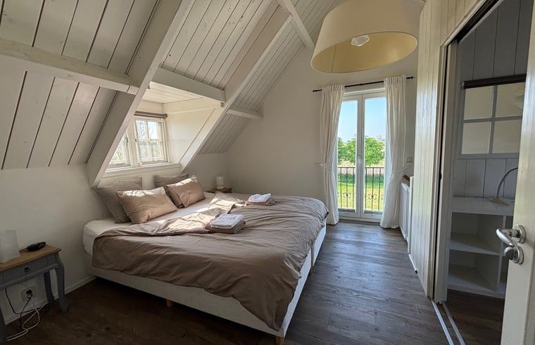 Gemuetliches Schlafzimmer im Ferienhaus in Anna Paulowna, Ferienhaus an der Wattenkueste, Nordholland.