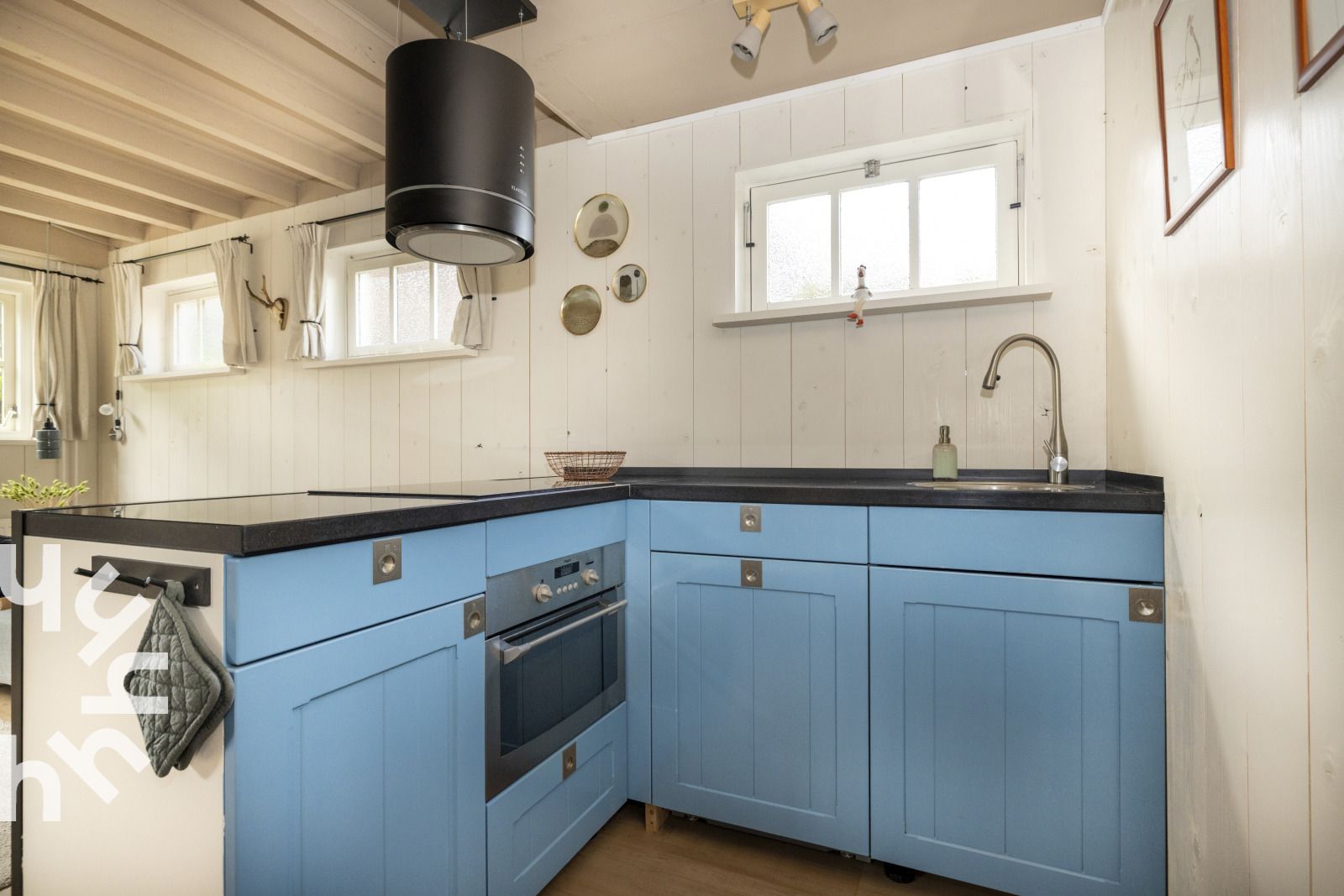 Luchtfoto van NH495 vakantiehuis in Sint-Pancras, Noord-Holland.