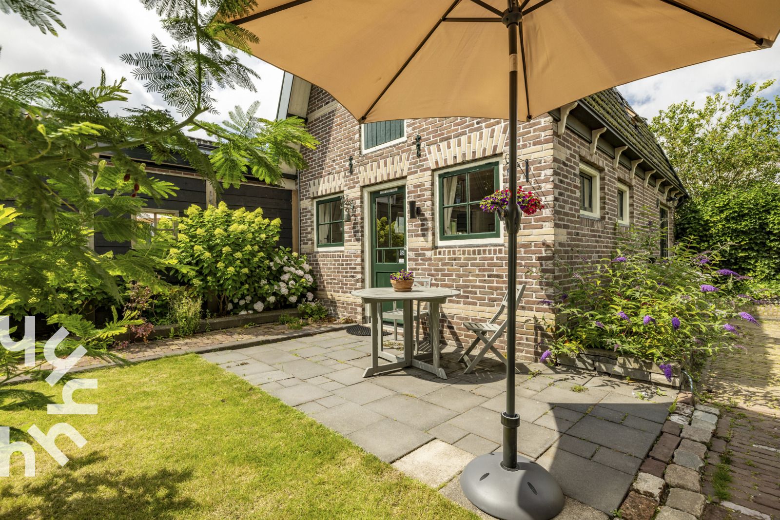 Moderne douche in NH495 vakantiehuis, Sint-Pancras, Noord-Holland.