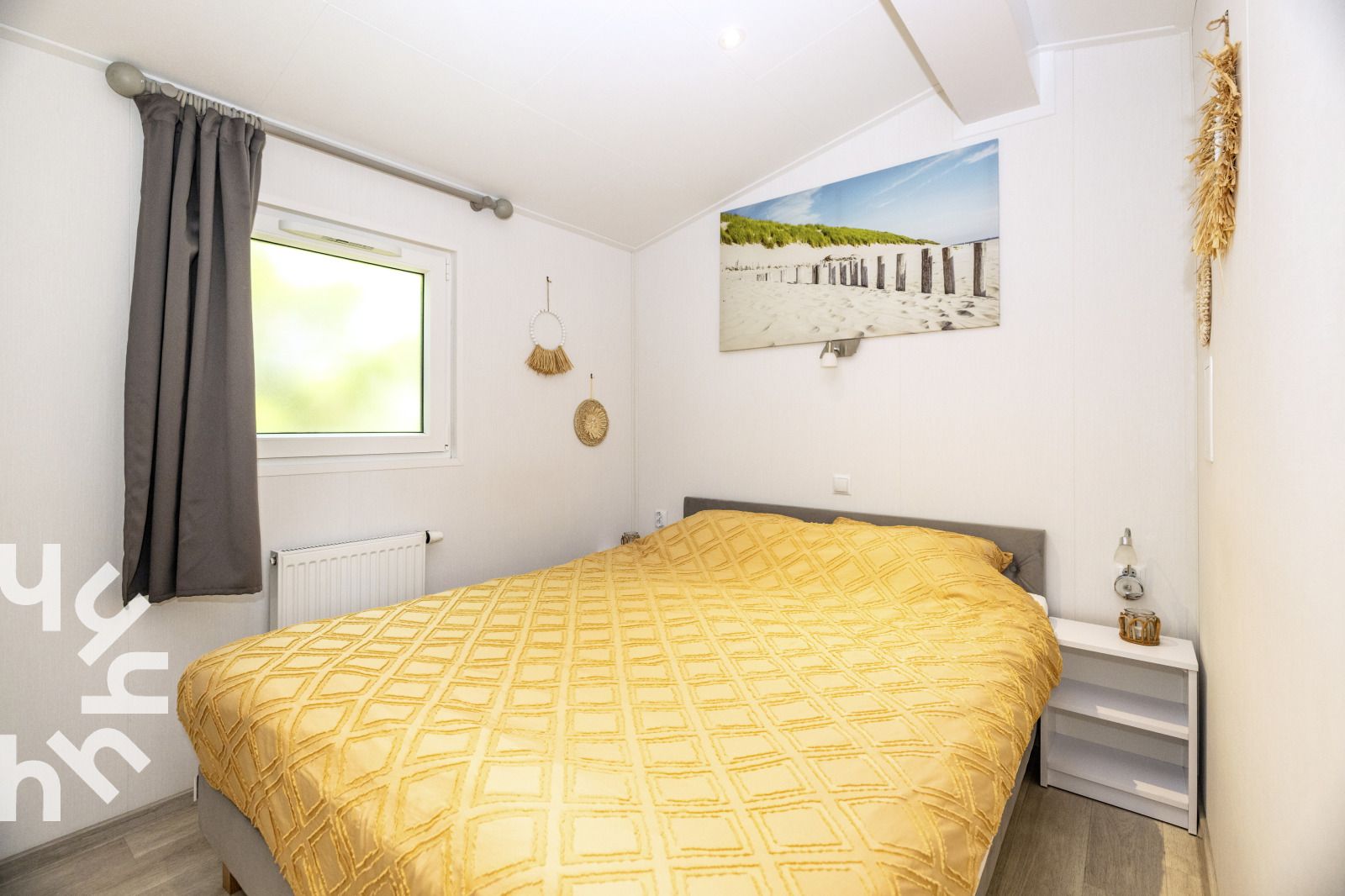 Geraeumiges Wohnzimmer des Ferienhauses NH392 in Schoorl, Nordholland.