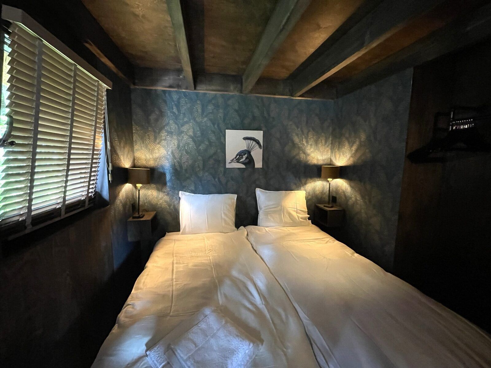 Bedroom in the 6-person Dune Lodge with Charging Point in Schoorl, North Holland. Comfortable and stylish vacation home.