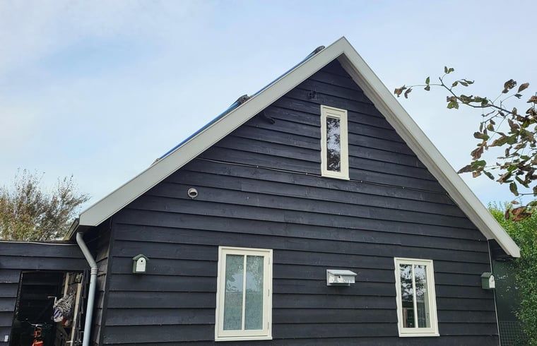 Huisje in Winkel, ein charmantes Ferienhaus in Nordholland Nord, bietet ein authentisches, laendliches Erlebnis inmitten der Natur.