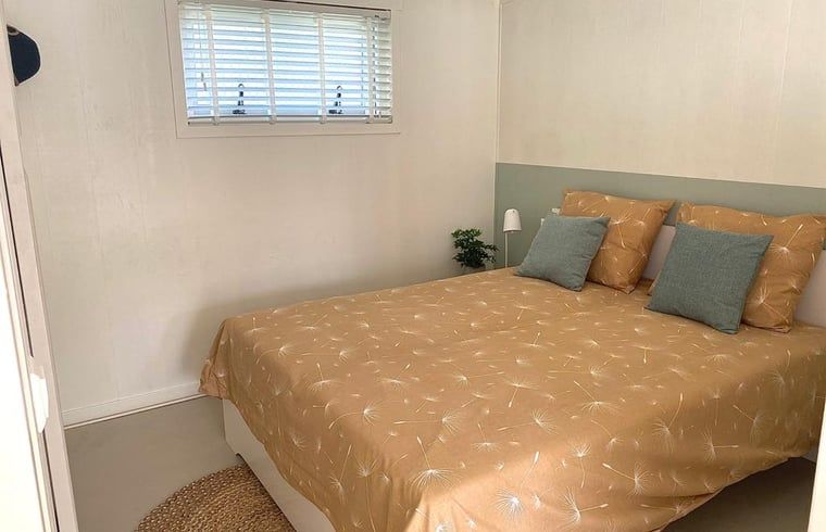 Bedroom in Holiday Home in Driehuizen, North Holland, with comfortable bed and quiet ambiance.