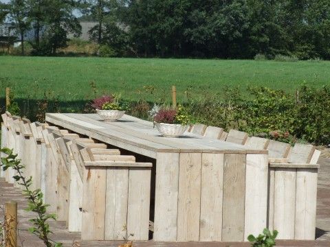 Geraeumige Terrasse im Ferienhaus Landgoed Nieuwhuis in Ootmarsum, Twente, ideal fuer Mahlzeiten im Freien in Overijssel.