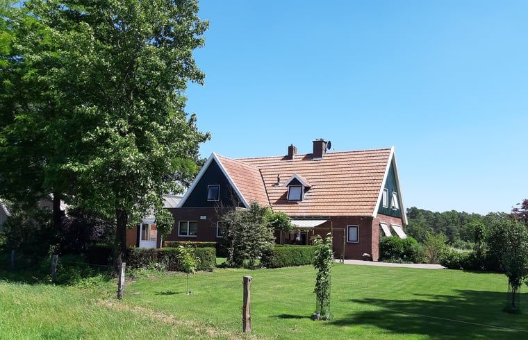 Huisje in Beuningen, vakantiehuis in Twente, Overijssel met groene tuin en landelijke omgeving, ideaal voor rustzoekers.