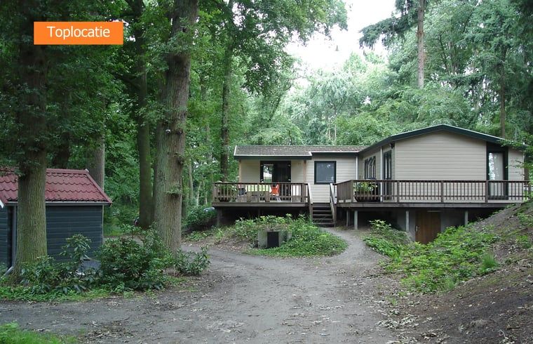 Vacation cottage in Haaksbergen offers a serene nature experience in Twente, Overijssel, with an inviting terrace surrounded by greenery.