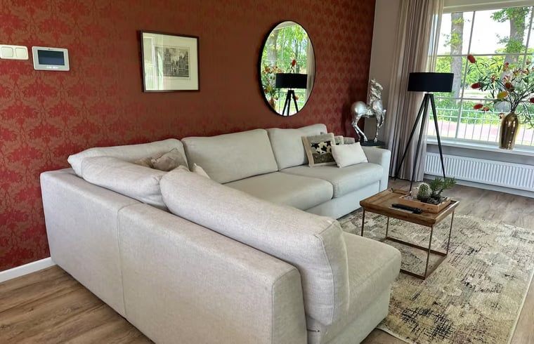 Stylish living room in Holiday home in Enschede, perfect for relaxation.