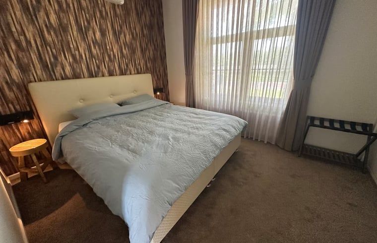 Comfortable bedroom in the cottage in Enschede, Twente, Overijssel.