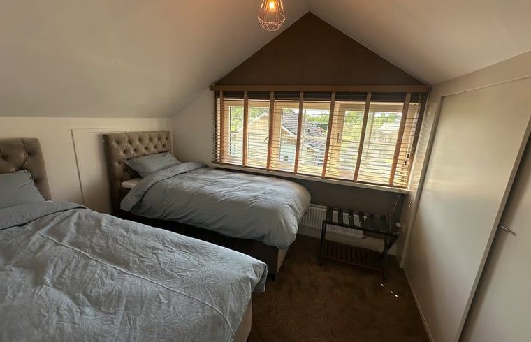 Double bedroom in attic in cottage in Enschede, cozy and warm.