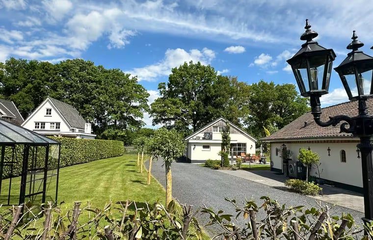 Cottage in Enschede with spacious garden and driveway, located in Twente.