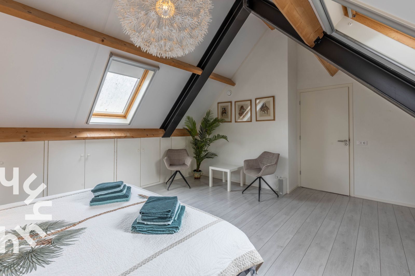 Stylish living room in vacation home OV659, Enter, Twente with lots of light.