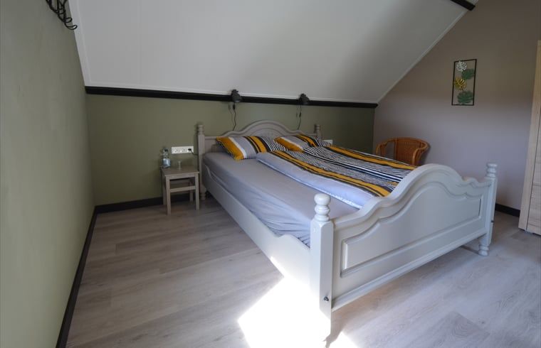 Comfortable bedroom in Holiday home in Denekamp, Twente, ideal for rest in Overijssel.