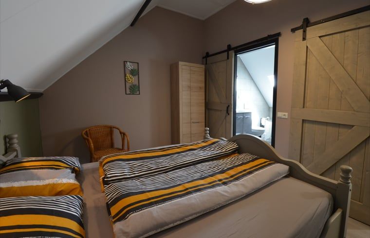 Bedroom with wooden accents in Holiday home in Denekamp, Twente, Overijssel.