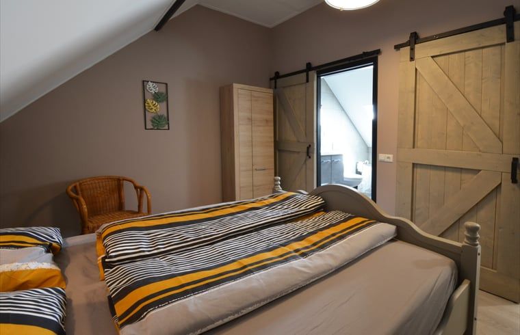 Bedroom with sliding doors in Holiday home in Denekamp, Twente, Overijssel.