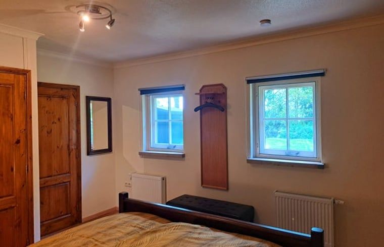 View from bedroom in Cottage in Denekamp, vacation home in Twente, Overijssel, with lots of natural light.