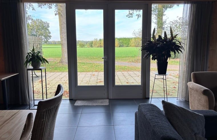 View of green fields from vacation home in Denekamp, Twente. Enjoy nature in this vacation home in Overijssel.