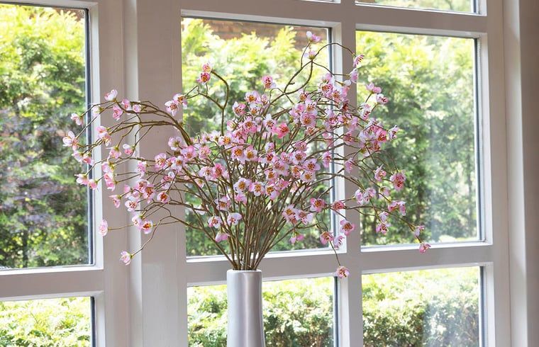 Cozy indoor area of Holiday Home in Losser, Twente, with a beautiful view of the green surroundings from the living room.