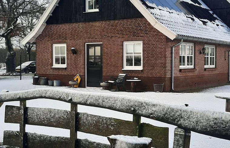 Children play happily at the vacation home in Manderveen, an ideal family destination in Twente.